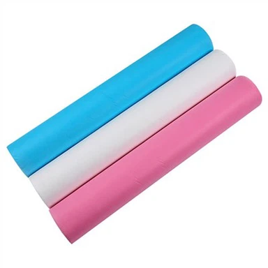 Llençols d'un sol ús per a llits hospitalaris